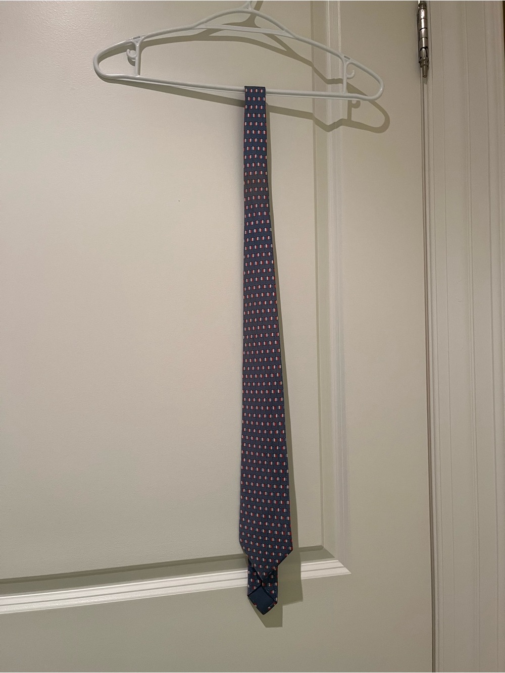 Hermes Navy Silk Tie with Small Pink Motif